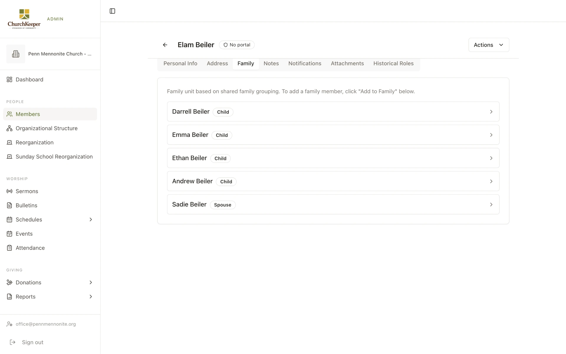 ChurchKeeper family record showing a household with spouse and children linked together.
